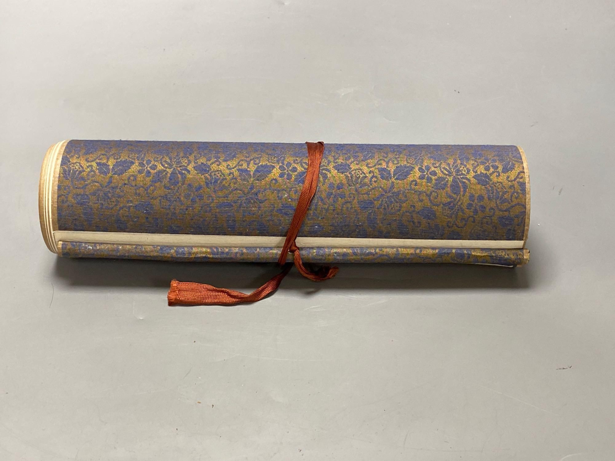 A Chinese landscape painting on silk handscroll with script, approximately 520 x 22cm